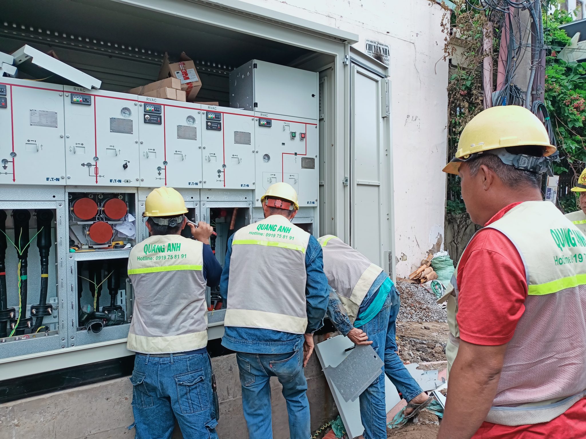 Engineers reviewing safety standards for electrical installation.