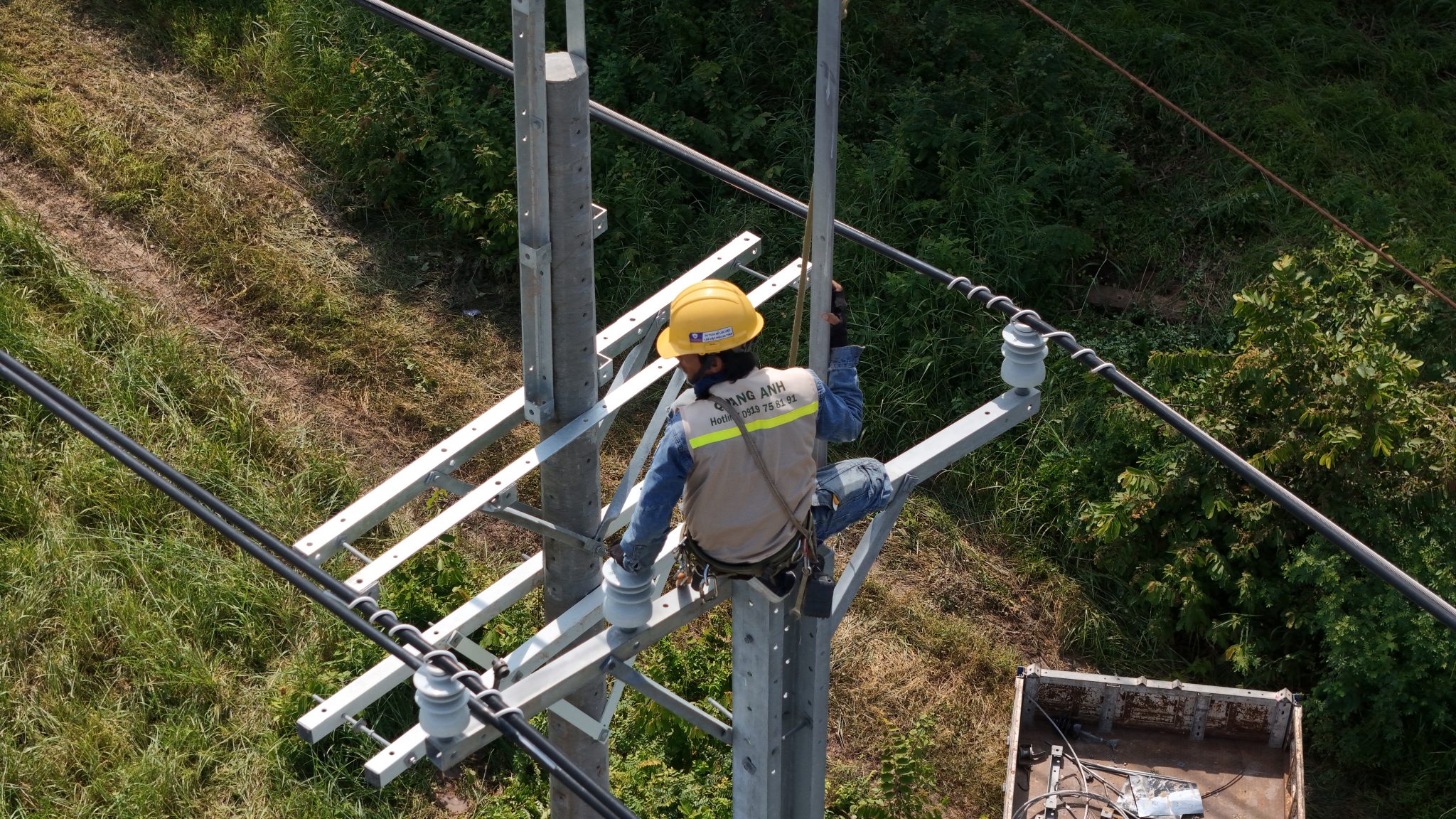 Quality and commitment of Quanganhcons Quanganhcons engineers discussing electrical system design.